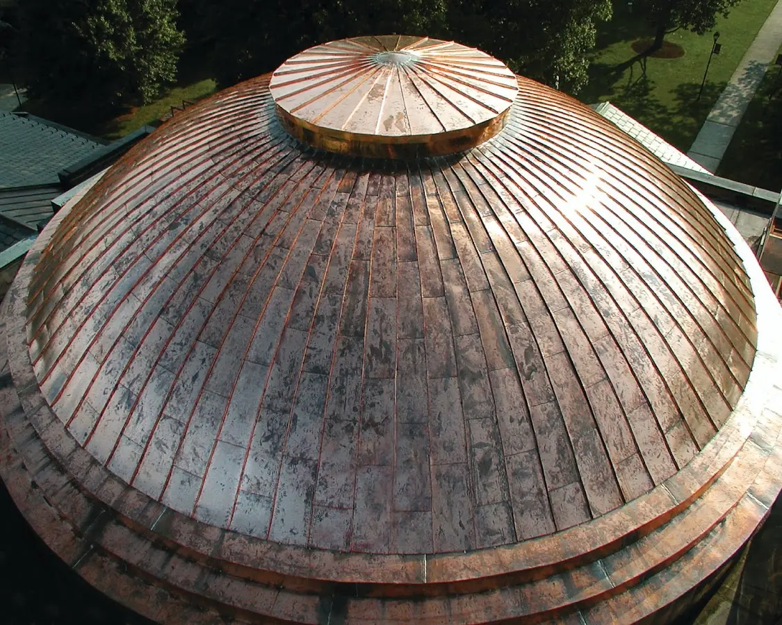 Craftsman Roofing crew installing a new roof in Stony Brook